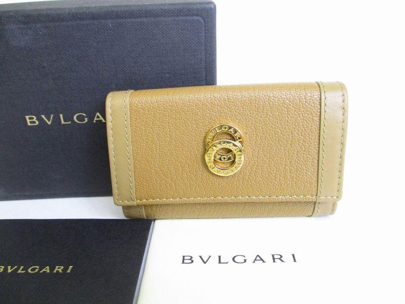 Оригинальные коричневые кожаные ключницы BVLGARI на 6 шт. #8317, восстановленные 
Оригинальные коричневые кожаные ключницы BVLGARI на 6 шт. #8317, восстановленные