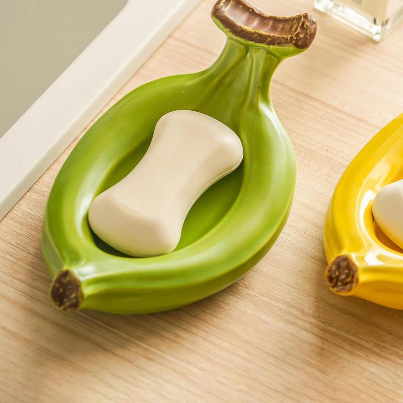 Ceramic Banana Ashtray Soap Dish Holder Drain Portable Home Bathroom Hotel Soap Box Tray Bathroom Accessories Crafts Gift A1
Ceramic Banana Ashtray Soap Dish Holder Drain Portable Home Bathroom Hotel Soap Box Tray Bathroom Accessories Crafts Gift A1
