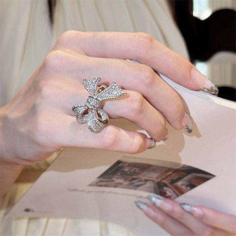 Fashion Retro Personalized Zircon Micro-Inlaid Full Diamond Big Bow Sweet Niche Design Open Ring Index Finger Ring One Size Fits All
Fashion Retro Personalized Zircon Micro-Inlaid Full Diamond Big Bow Sweet Niche Design Open Ring Index Finger Ring One Size Fits All