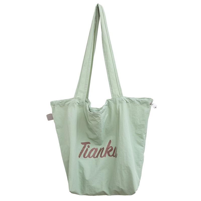 New student leisure commuting large-capacity lightweight tote bag simple nylon cloth drawstring shoulder bag women зелений
New student leisure commuting large-capacity lightweight tote bag simple nylon cloth drawstring shoulder bag women зелений
