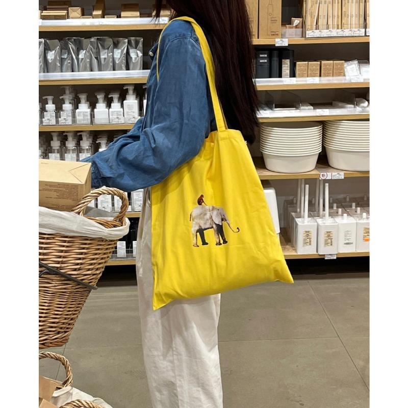 Stylish white yellow baby elephant canvas bag ins portable shoulder bag leisure shopping bag women s bag wholesale
Stylish white yellow baby elephant canvas bag ins portable shoulder bag leisure shopping bag women s bag wholesale