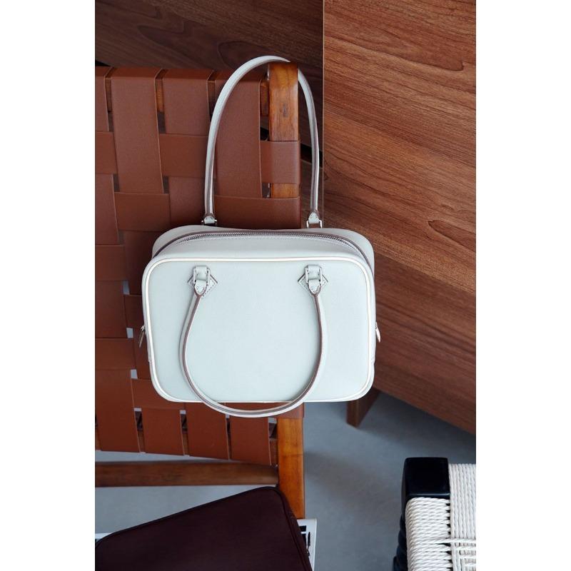 Высококлассный Премиальное ощущение Плюмаж Полностью стальной Натуральная кожа Сумка-перо Ручная маленькая квадратная сумка Портативная Роскошная Легкая 20x7x15cm