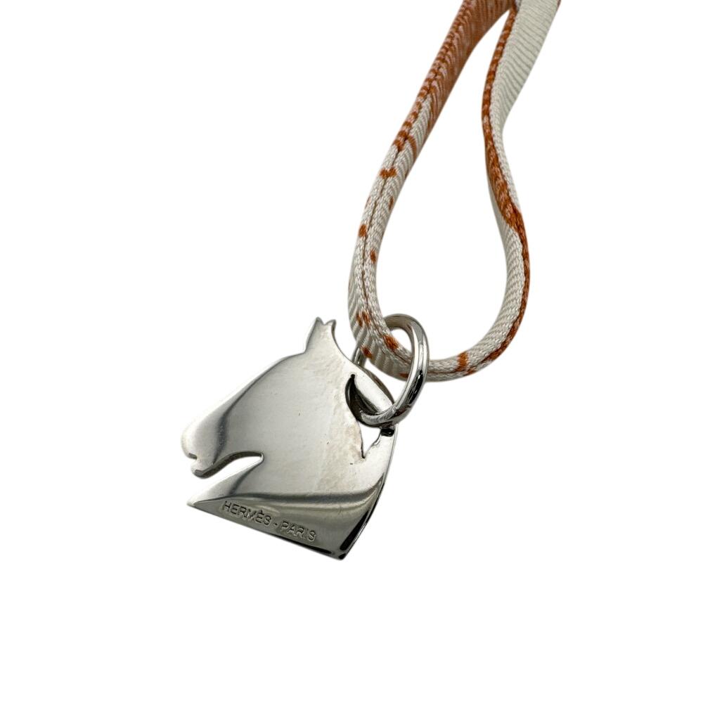 HERMES Choker with horse motif pendant silk Hermès Tourbillon Necklace Necklace Silver silk Used
HERMES Choker with horse motif pendant silk Hermès Tourbillon Necklace Necklace Silver silk Used