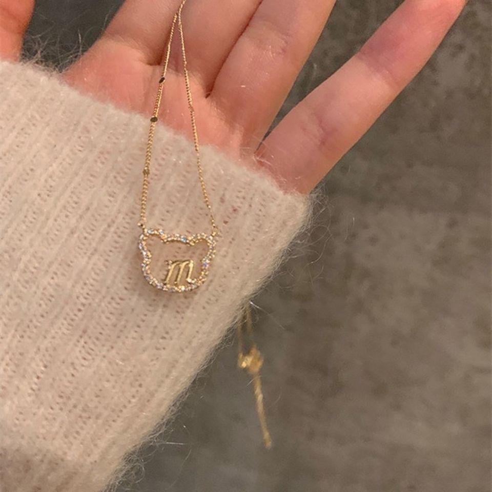 Hollow necklace female letter bear pendant collarbone chain female minimalist design ins cold wind 2025 new model
Hollow necklace female letter bear pendant collarbone chain female minimalist design ins cold wind 2025 new model