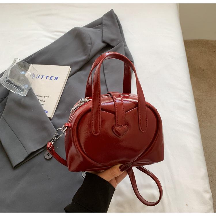 Trend niche portable Boston bag women s 2025 summer new high-end simple shoulder messenger bag бордовий
Trend niche portable Boston bag women s 2025 summer new high-end simple shoulder messenger bag бордовий