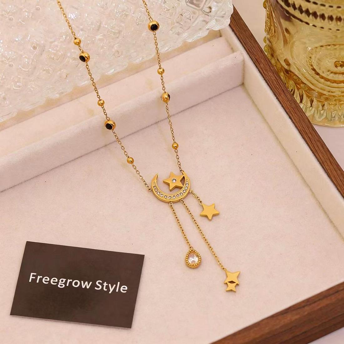 Euro-American star and moon tassel pendant necklace, niche design stainless steel Y-necklace, light luxury neck jewelry
Euro-American star and moon tassel pendant necklace, niche design stainless steel Y-necklace, light luxury neck jewelry