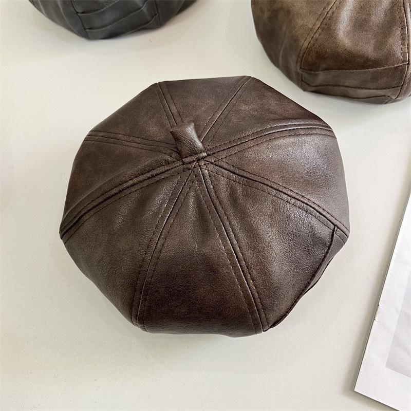 Autumn new PU leather beret women s spring and summer octagonal hat retro painter hat showing face small hat M(56-58cm) темно-коричневого кольору
Autumn new PU leather beret women s spring and summer octagonal hat retro painter hat showing face small hat M(56-58cm) темно-коричневого кольору
