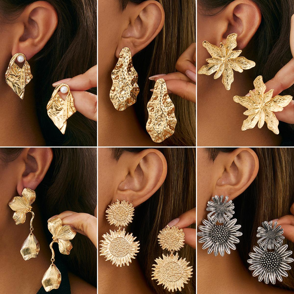 Lava three-dimensional sun flower pendant stud earrings female, exaggerated personality retro liquid ears
Lava three-dimensional sun flower pendant stud earrings female, exaggerated personality retro liquid ears