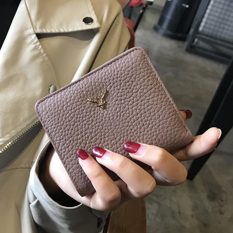 Cowhide Women s Purses Short Thin Small Wallet Chic Christmas Deer Button Ladies Genuine Leather Card Holder Wallet Coin Purse
Cowhide Women s Purses Short Thin Small Wallet Chic Christmas Deer Button Ladies Genuine Leather Card Holder Wallet Coin Purse