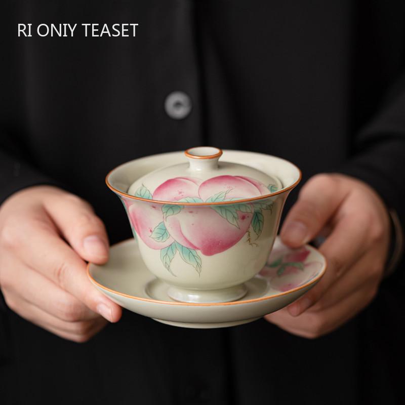 Chinese Retro Ru Kiln Gaiwan Hand-painted Peach Pattern Ceramic Tea Tureen Teacup Handmade Tea Bowl Travel Teaware Accessories 11.x8.3cm 150ml
Chinese Retro Ru Kiln Gaiwan Hand-painted Peach Pattern Ceramic Tea Tureen Teacup Handmade Tea Bowl Travel Teaware Accessories 11.x8.3cm 150ml