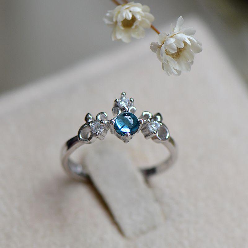 Elegant Blue Topaz Crown-Inspired Pinky Ring for Women 
Elegant Blue Topaz Crown-Inspired Pinky Ring for Women