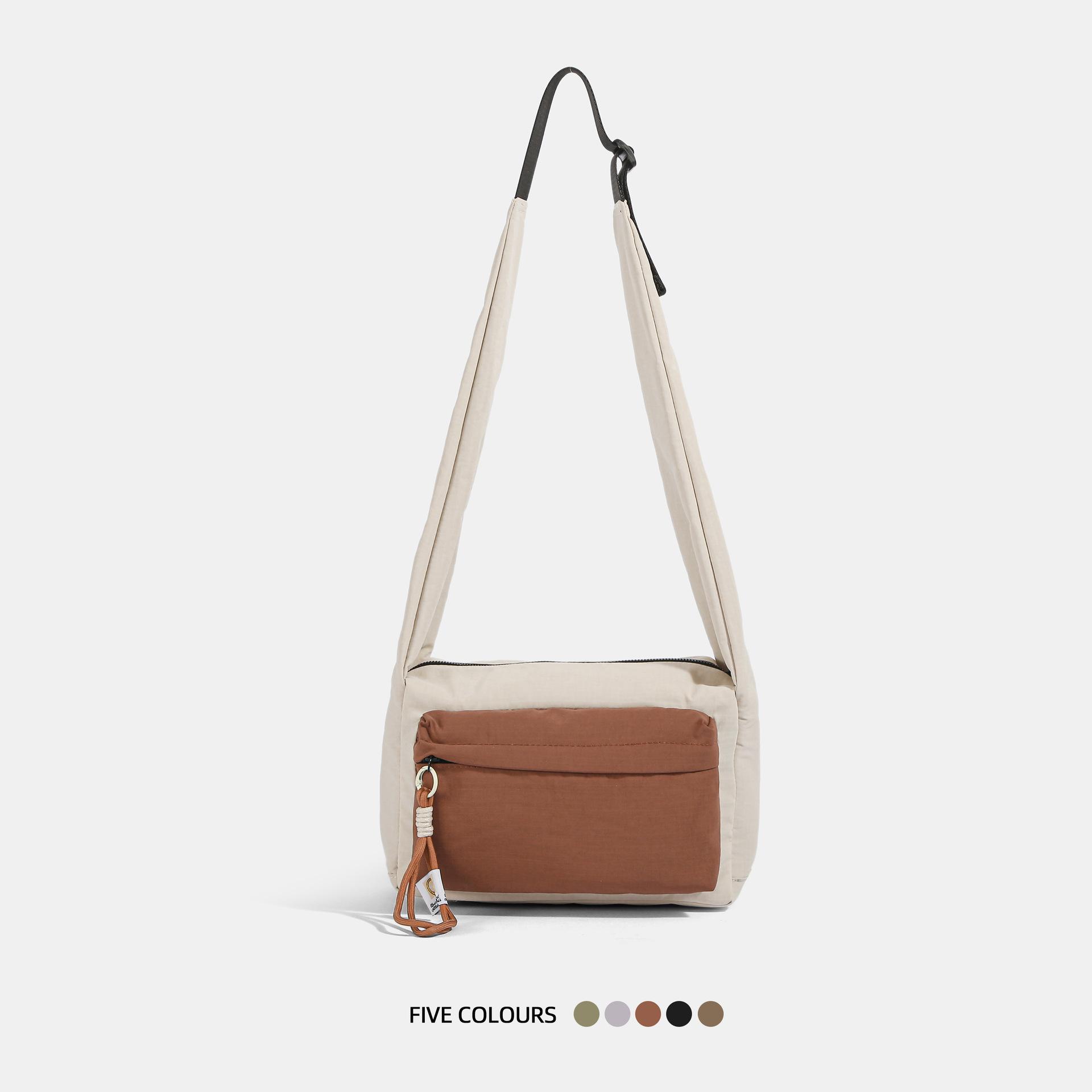 Niche design commuter bag tide shoulder messenger bag high sense small square bag light large capacity color matching cloth bag коричневый
Niche design commuter bag tide shoulder messenger bag high sense small square bag light large capacity color matching cloth bag коричневый