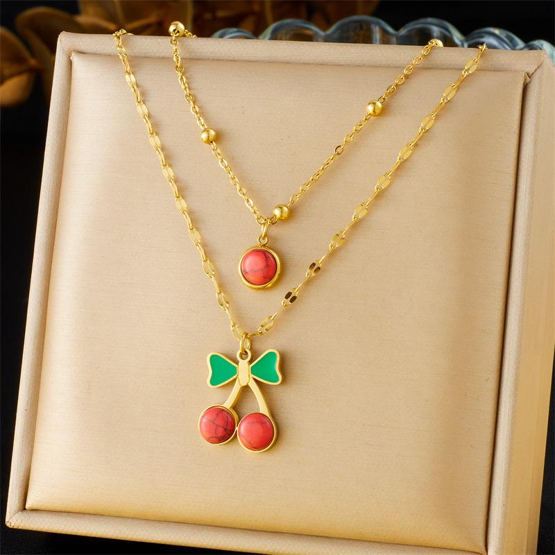 Vintage Layered Two Strand Necklace with Rhinestone Enamel Cherry Heart Compass Pendant
Vintage Layered Two Strand Necklace with Rhinestone Enamel Cherry Heart Compass Pendant