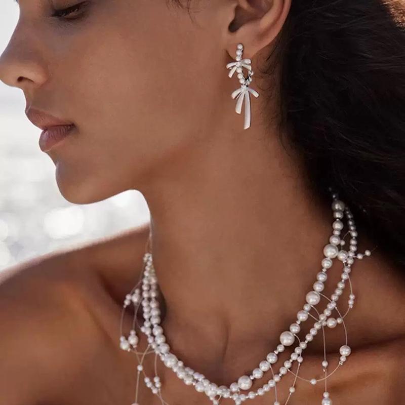 Satin bow stud earrings women s light luxury elegant fringed pearl earrings, earrings, mosquito coil disc, no ear piercings, earrings.
Satin bow stud earrings women s light luxury elegant fringed pearl earrings, earrings, mosquito coil disc, no ear piercings, earrings.