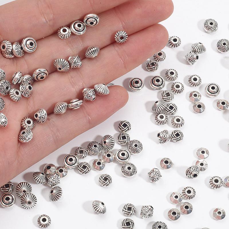 Butterfly and Flower Alloy Spacer Beads for DIY Jewelry: Semi-Finished Products for Stringing Bracelets and Necklaces.
Butterfly and Flower Alloy Spacer Beads for DIY Jewelry: Semi-Finished Products for Stringing Bracelets and Necklaces.