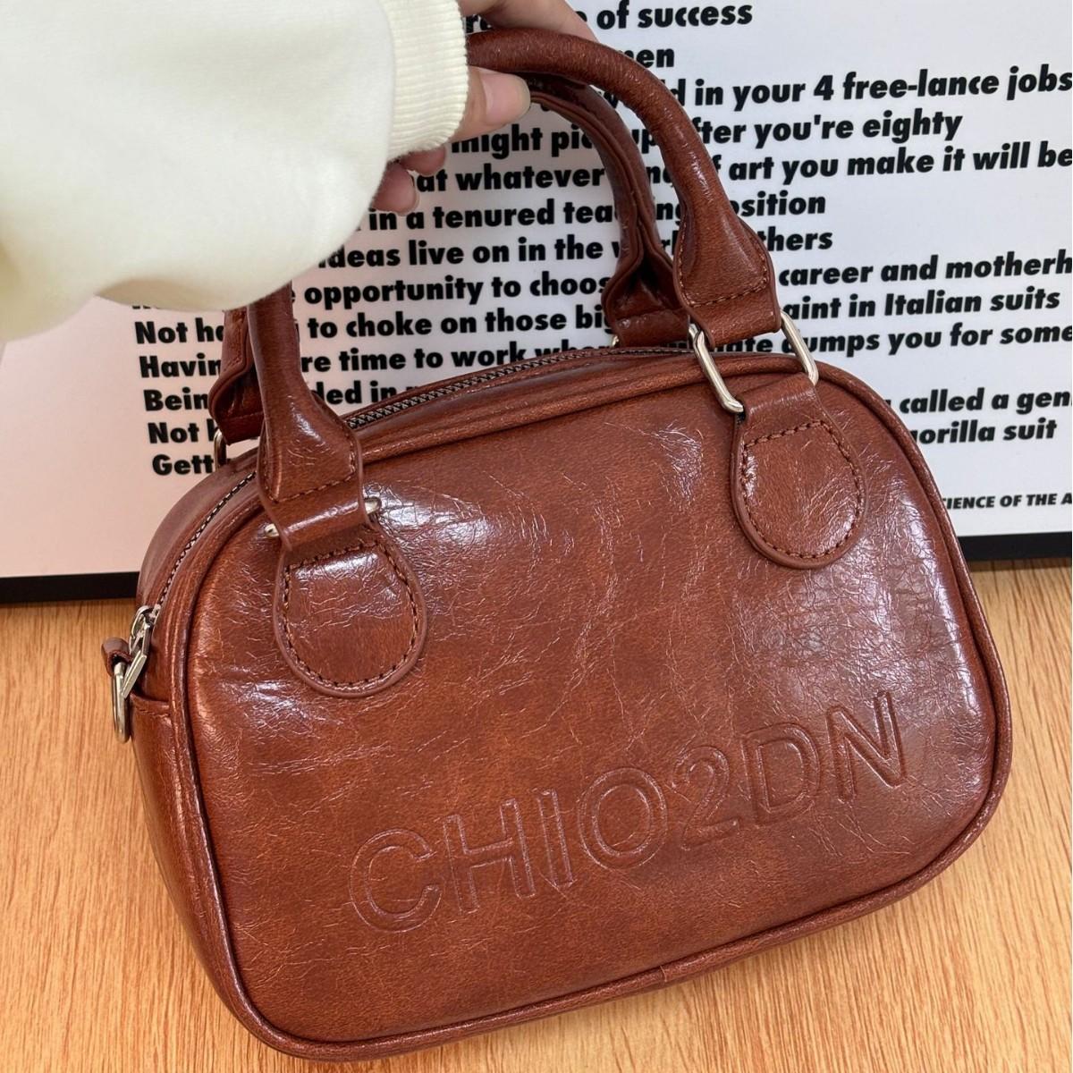 Korean niche portable bowling bag women s 2025 new trendy retro small square bag versatile ins messenger bag
Korean niche portable bowling bag women s 2025 new trendy retro small square bag versatile ins messenger bag