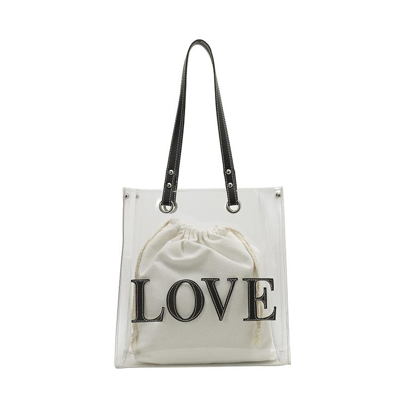 Women Fashion Transparent PVC Handbag Female Clear Brown Shoulder Bag LOVE Letter Printing Tote Bags Summer Beach Handbags
Women Fashion Transparent PVC Handbag Female Clear Brown Shoulder Bag LOVE Letter Printing Tote Bags Summer Beach Handbags