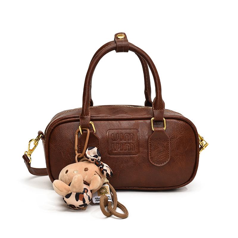 Женская высококачественная ретро сумка-боулинг через плечо, осенняя коллекция 2024
Женская высококачественная ретро сумка-боулинг через плечо, осенняя коллекция 2024