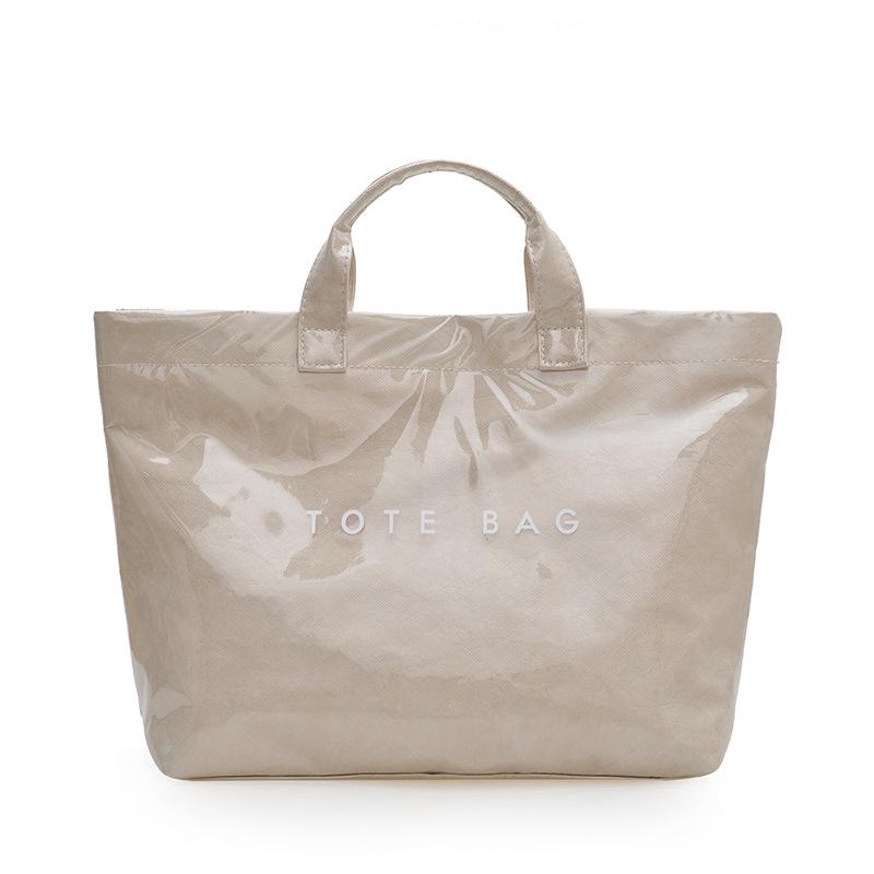 Высококачественная женская сумка-тоут из бумаги Дюпон: Вместительная, стильная и универсальная повседневная сумка бежевый
Высококачественная женская сумка-тоут из бумаги Дюпон: Вместительная, стильная и универсальная повседневная сумка бежевый