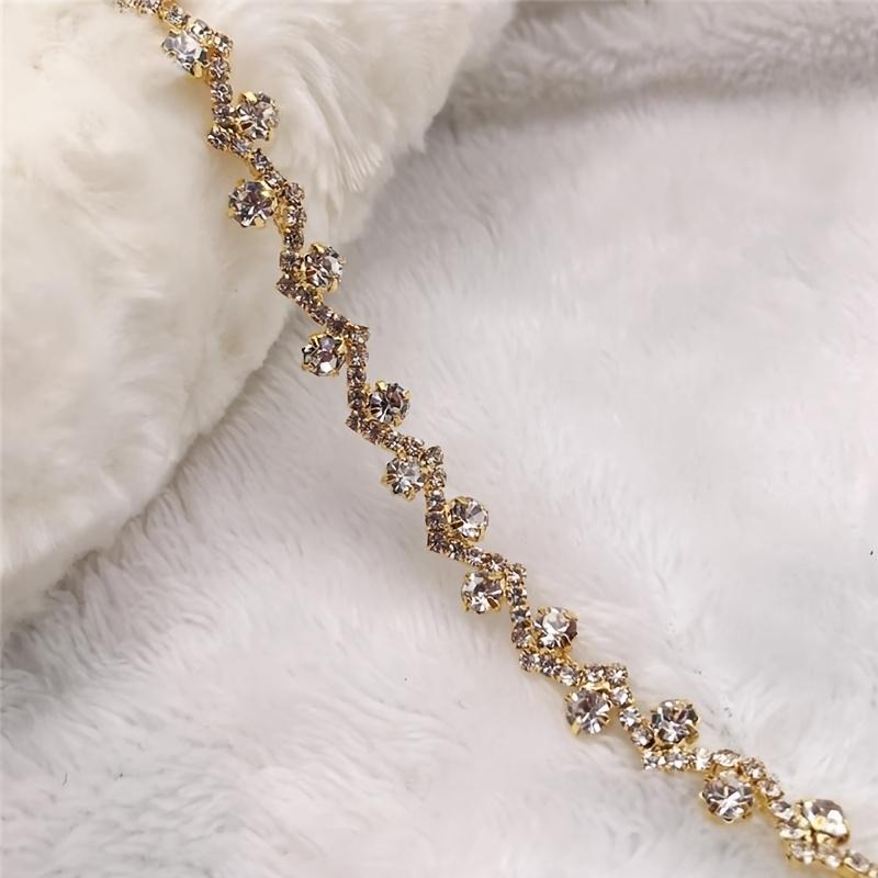 1 yard S-shaped glass rhinestone chain, 0.9cm wide, AB color, for headbands, hair accessories, dresses & bridal jewelry 50CM≈19.69inch
1 yard S-shaped glass rhinestone chain, 0.9cm wide, AB color, for headbands, hair accessories, dresses & bridal jewelry 50CM≈19.69inch