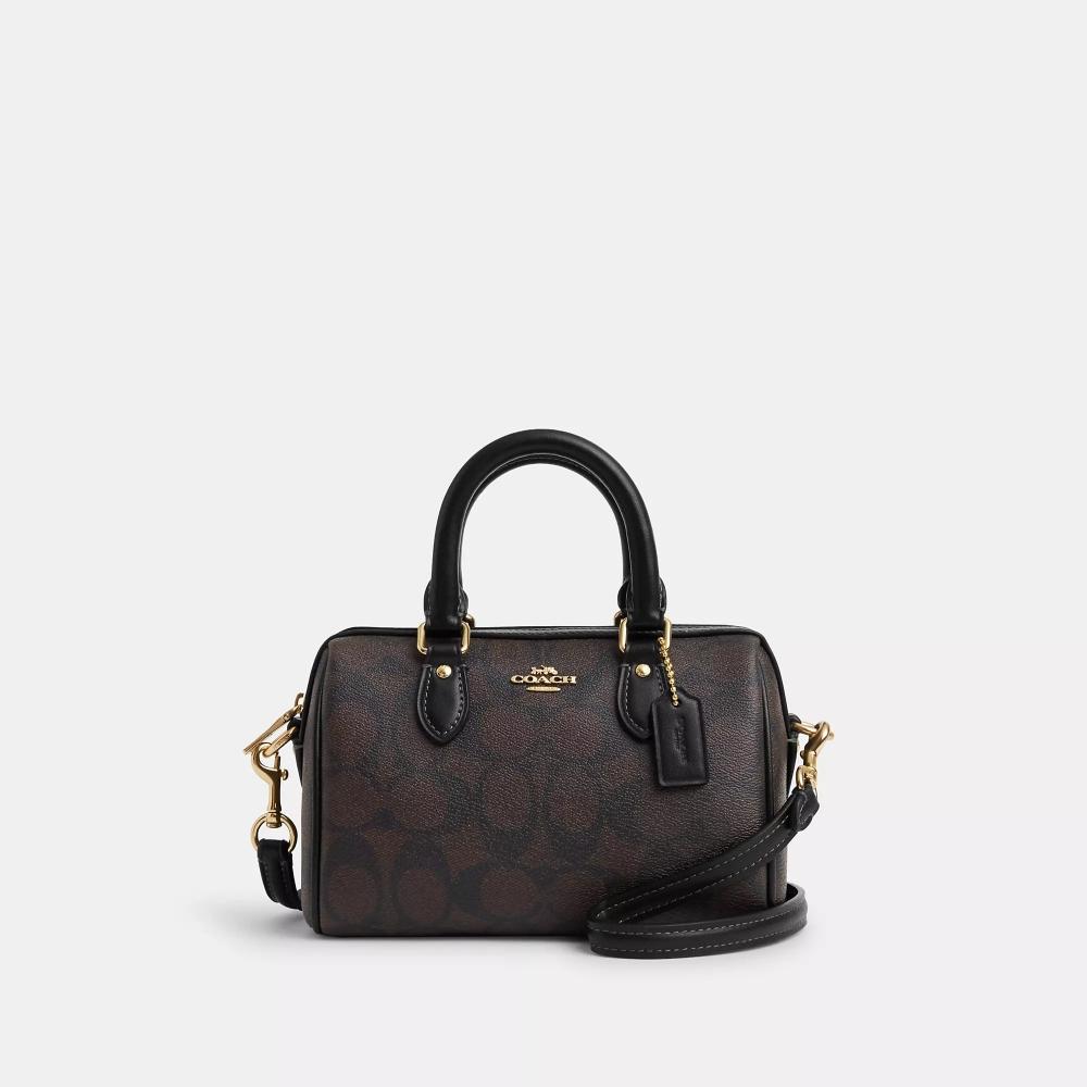 Сумка через плечо Coach Mini Rowan из канвы Signature золотистого, коричневого, черного цвета
Сумка через плечо Coach Mini Rowan из канвы Signature золотистого, коричневого, черного цвета