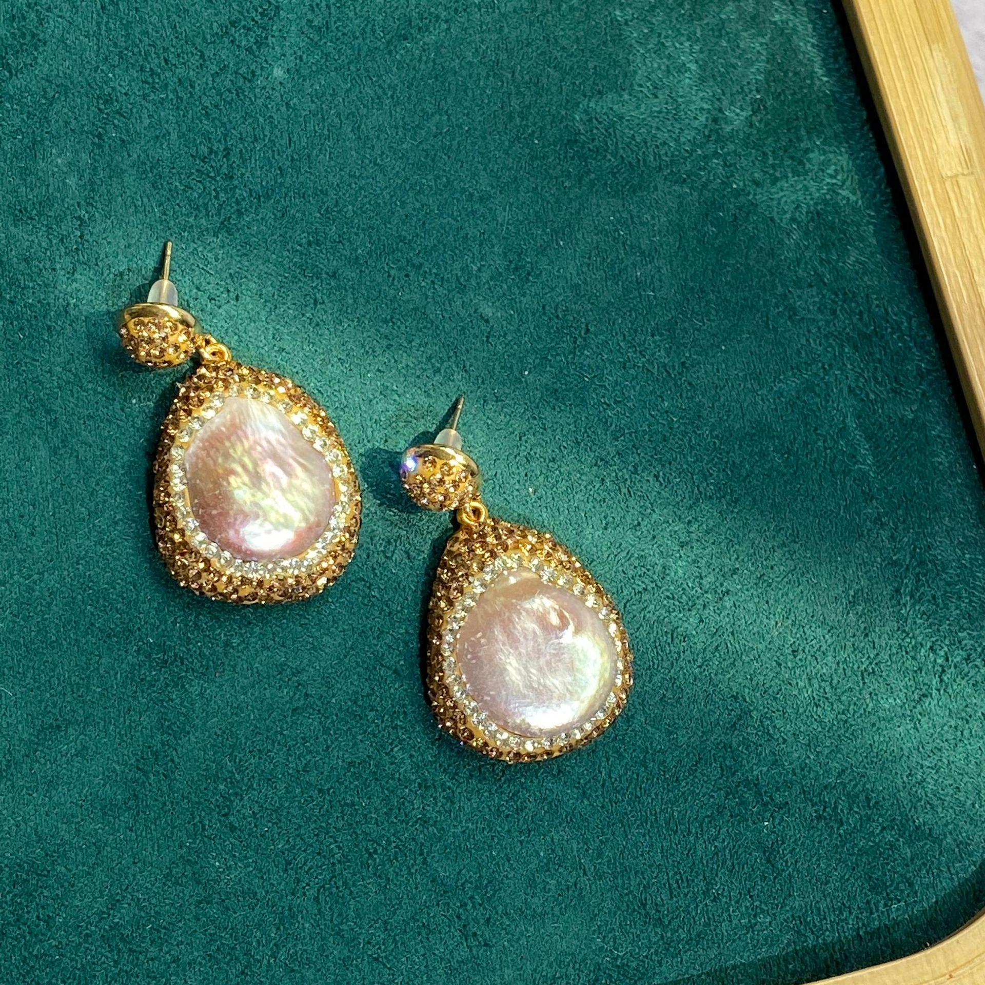 Серьги ручной работы с натуральным барочным жемчугом и бриллиантами с крючками для ушей
Серьги ручной работы с натуральным барочным жемчугом и бриллиантами с крючками для ушей