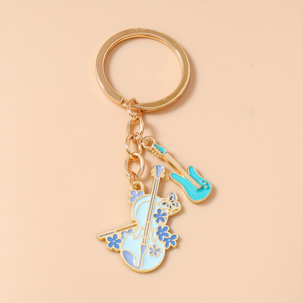 New Enamel Violin Guitar keychain Women Girls Musical Instrument Key Ring Pendant for Handbag Decor DIY Key Holder Jewelry Gift
New Enamel Violin Guitar keychain Women Girls Musical Instrument Key Ring Pendant for Handbag Decor DIY Key Holder Jewelry Gift