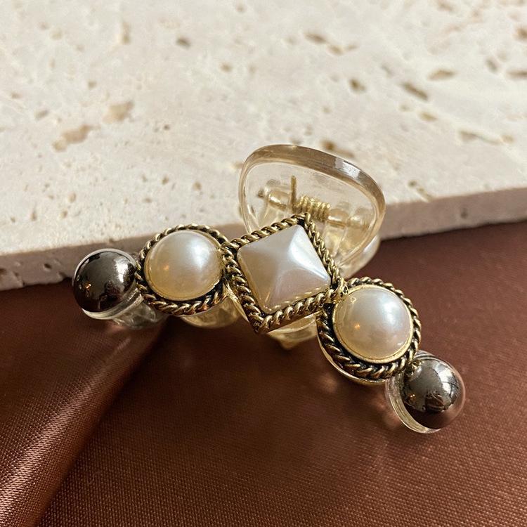 Заколка для волос «Жемчужина лета» в виде акулы: Элегантный корейский зажим для женщин
Заколка для волос «Жемчужина лета» в виде акулы: Элегантный корейский зажим для женщин