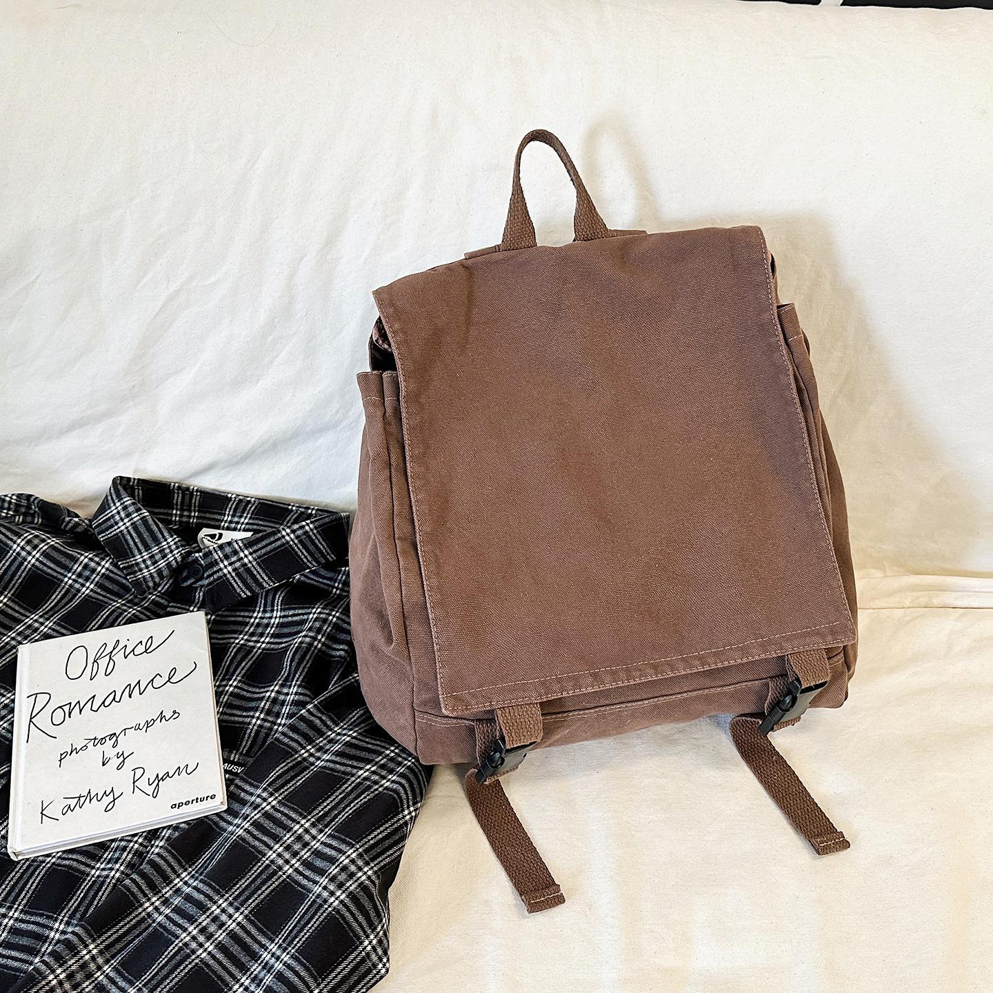 High value retro canvas flip tooling wind backpack female couple college student schoolbag male solid color travel backpack темно-коричневого кольору
High value retro canvas flip tooling wind backpack female couple college student schoolbag male solid color travel backpack темно-коричневого кольору