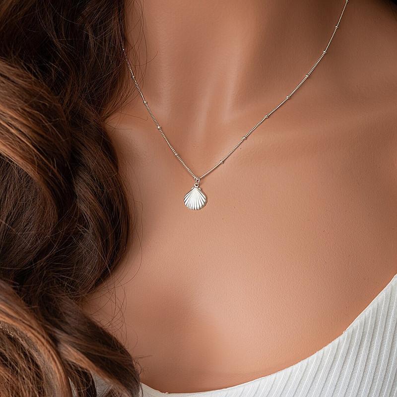 Korean version of Dongmen niche in shell collarbone chain, simple and versatile metal scallop pendant necklace
Korean version of Dongmen niche in shell collarbone chain, simple and versatile metal scallop pendant necklace