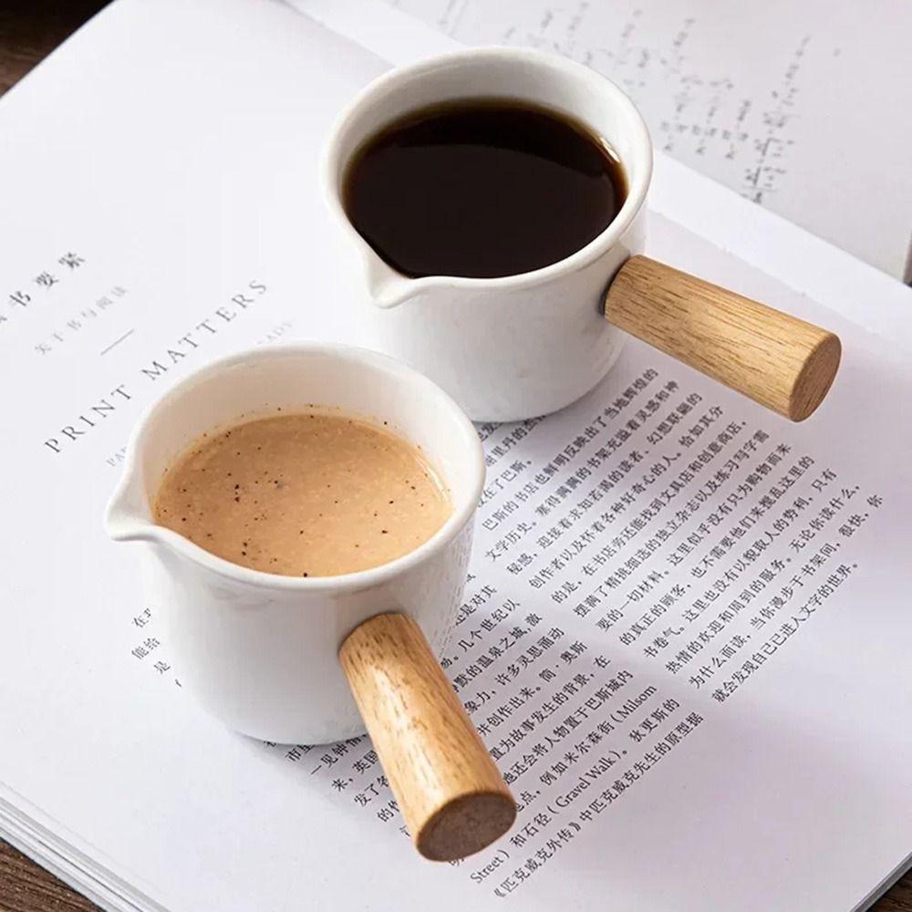 Pointed Mouth Milk Frothing Cup Wooden Handle Pouring Milk Jug Small Ceramics Milk Pot Household
Pointed Mouth Milk Frothing Cup Wooden Handle Pouring Milk Jug Small Ceramics Milk Pot Household