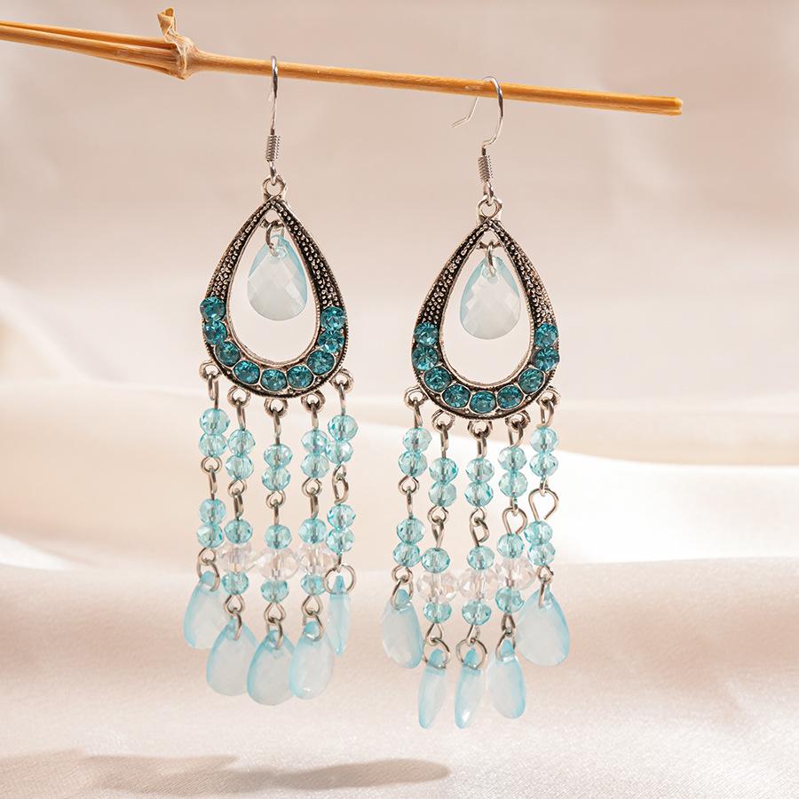 Hollow Drop-shaped Tassel Ear Hook Ethnic Style High-end Earrings for Women синій
Hollow Drop-shaped Tassel Ear Hook Ethnic Style High-end Earrings for Women синій