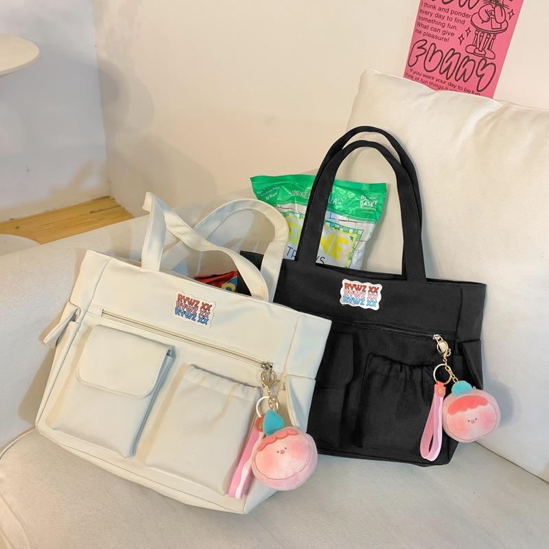 Student tutoring bag, nylon cloth bag, women s shoulder bag, simple and large-capacity book bag, class bag, versatile single package чорний
Student tutoring bag, nylon cloth bag, women s shoulder bag, simple and large-capacity book bag, class bag, versatile single package чорний