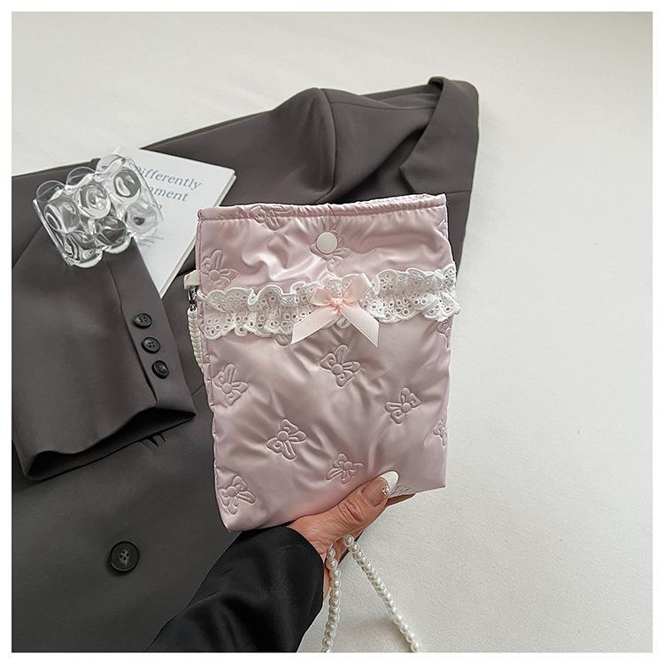 2025 summer new bow messenger bag mobile phone bag pearl chain niche design versatile bucket bag розовый
2025 summer new bow messenger bag mobile phone bag pearl chain niche design versatile bucket bag розовый