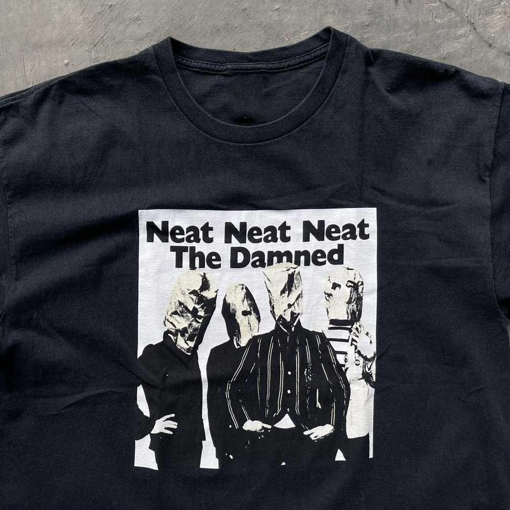 vintage early 2000s the damned neat neat neat not buzzcocks T-shirt D211 Unisex T-Shirt S
vintage early 2000s the damned neat neat neat not buzzcocks T-shirt D211 Unisex T-Shirt S