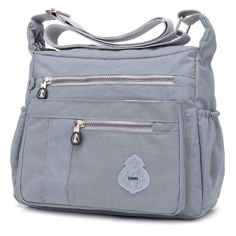 Женская водостойкая нейлоновая сумка-кроссбоди через плечо с цветочным дизайном
Женская водостойкая нейлоновая сумка-кроссбоди через плечо с цветочным дизайном