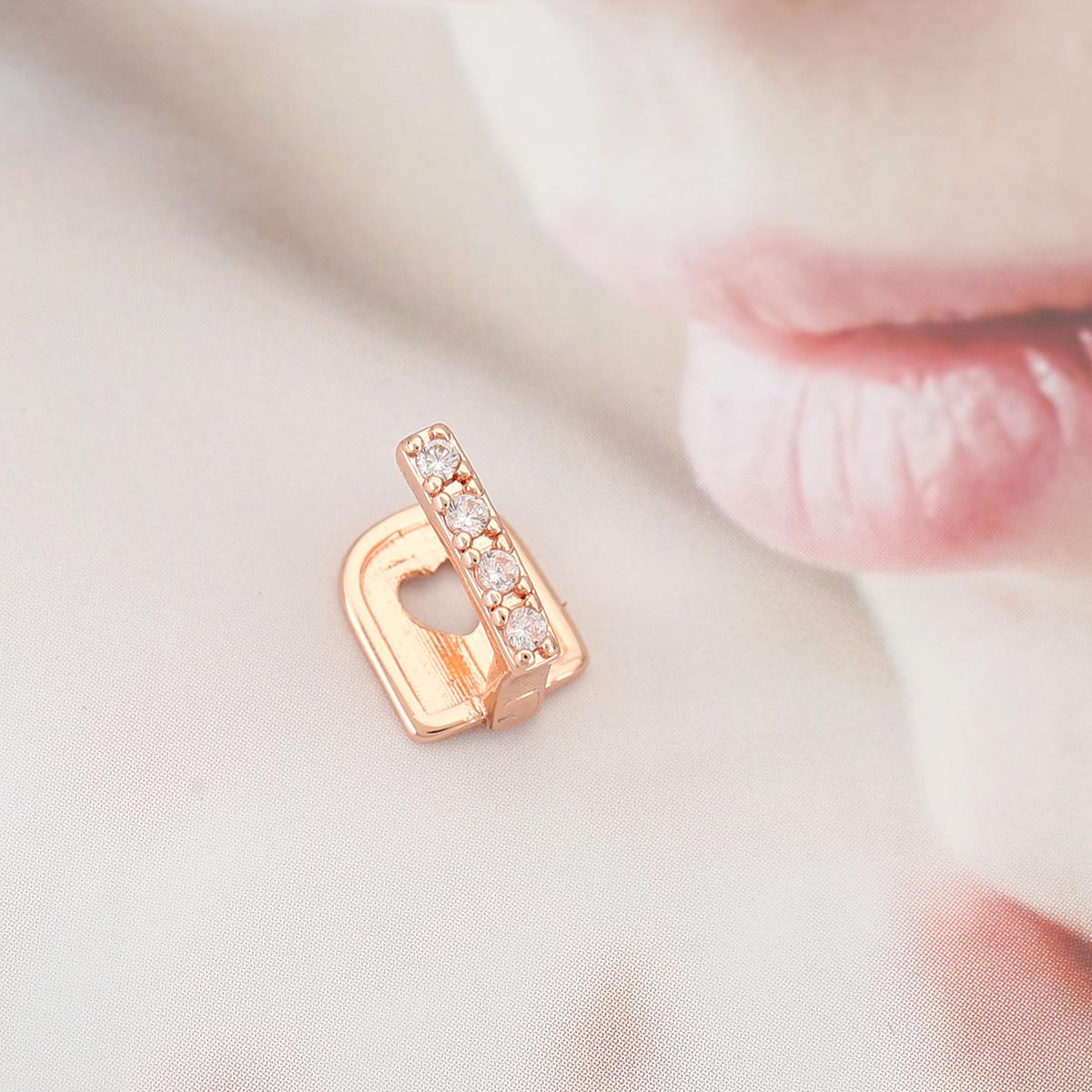 Gold Tooth Grillz with Diamond Inlay - Hip Hop Style Dental Ornament розового золота
Gold Tooth Grillz with Diamond Inlay - Hip Hop Style Dental Ornament розового золота