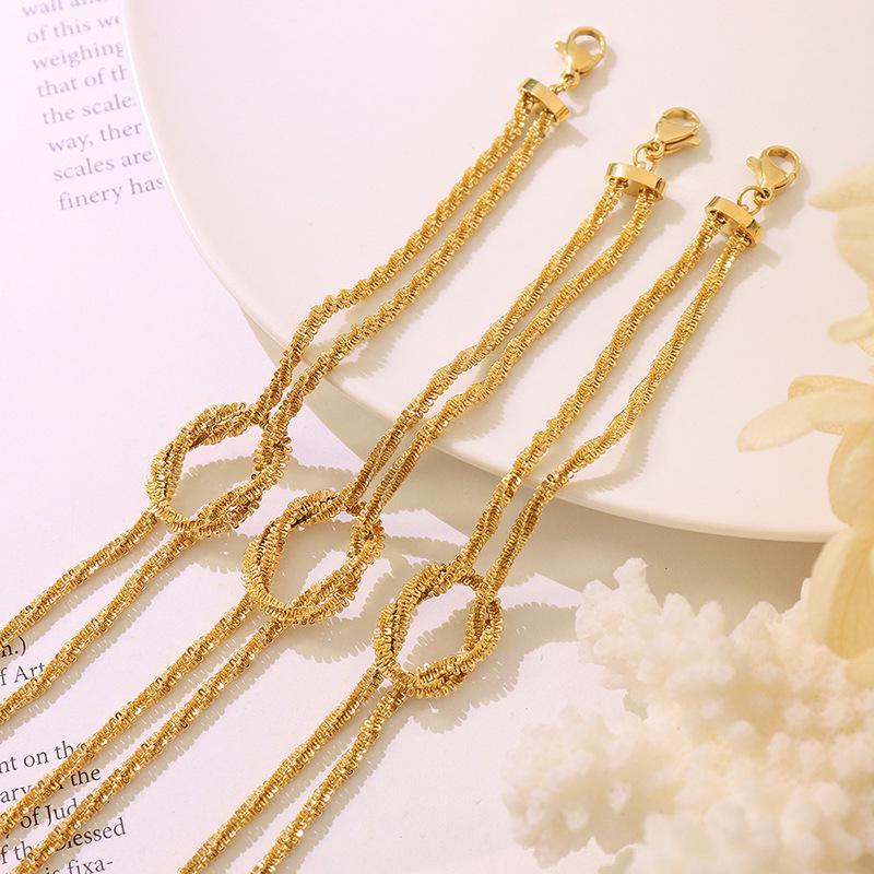 Minimalist Knotted Bracelet: Titanium Steel with 18k Gold Plating, Japanese & Korean Design for Women - Model E310
Minimalist Knotted Bracelet: Titanium Steel with 18k Gold Plating, Japanese & Korean Design for Women - Model E310