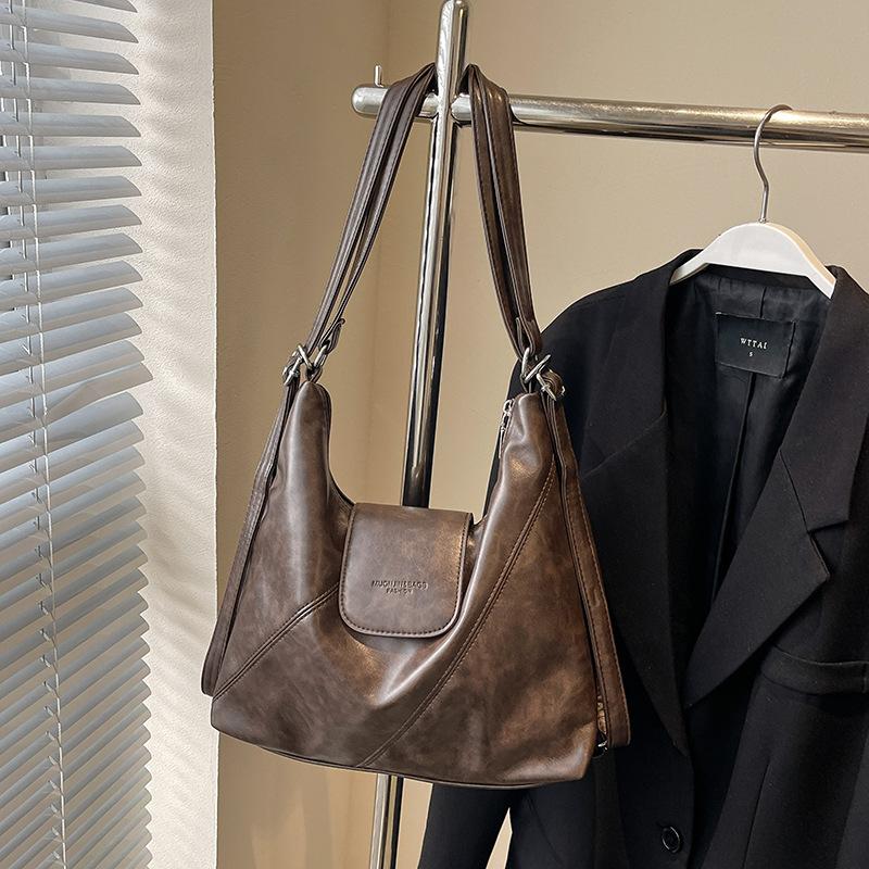 Оптовая горячая распродажа сумка-тоут из мягкой кожи в простом ретро-стиле в гонконгском стиле, высококачественная, для通勤, универсальная, с несколькими способами ношения, на плечо, женская сумка
Оптовая горячая распродажа сумка-тоут из мягкой кожи в простом ретро-стиле в гонконгском стиле, высококачественная, для通勤, универсальная, с несколькими способами ношения, на плечо, женская сумка