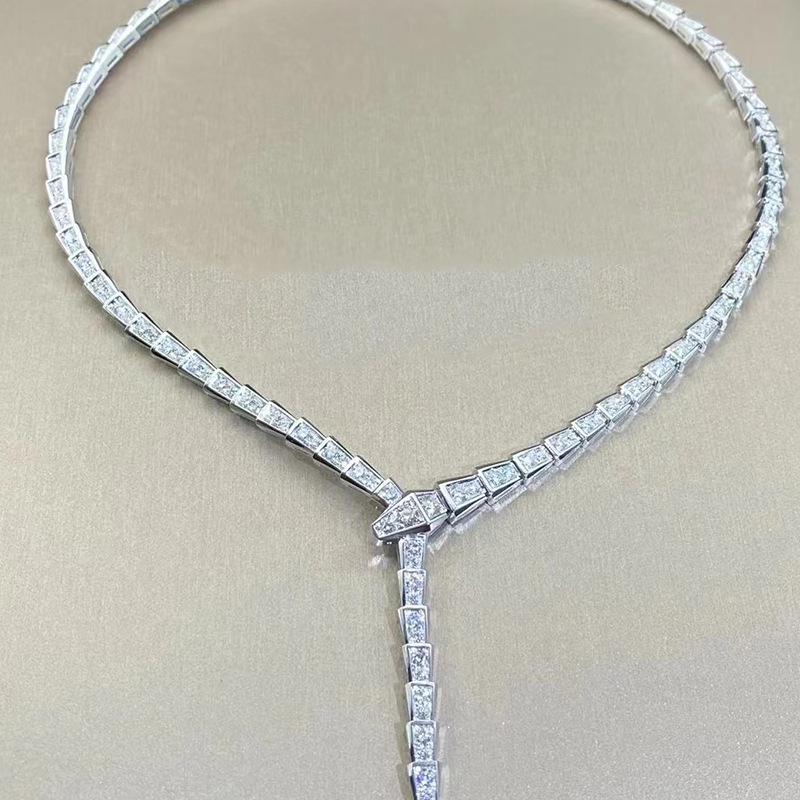 Hui Zhi Yi Ожерелье из серебра 925 пробы с бриллиантами в виде змеи - Заявление о моде высокого класса S925 Silver
Hui Zhi Yi Ожерелье из серебра 925 пробы с бриллиантами в виде змеи - Заявление о моде высокого класса S925 Silver