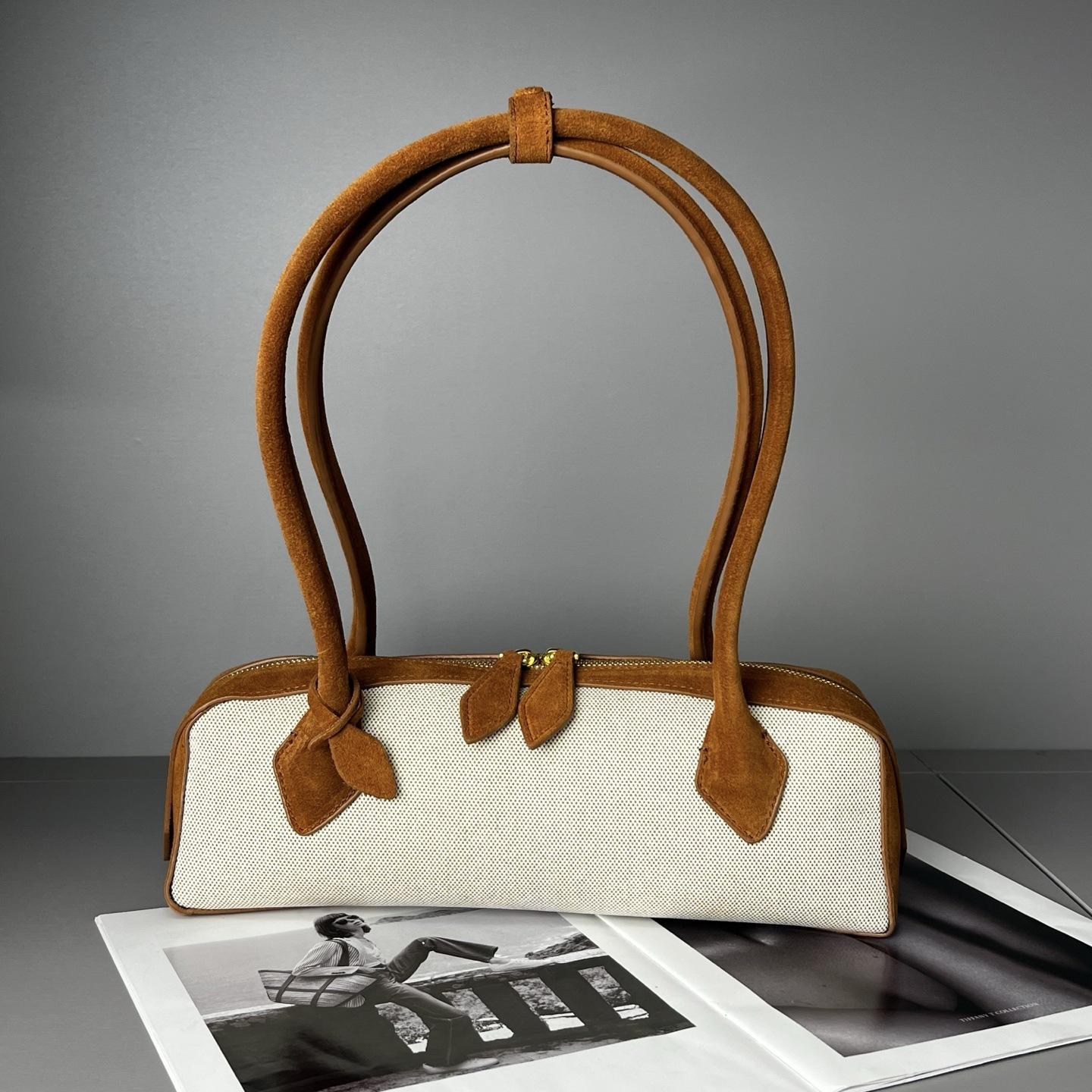 French niche sausage bag retro underarm baguette bag genuine leather women s commuting fashion versatile single shoulder handheld women s bag 32x10x11cm коричневий
French niche sausage bag retro underarm baguette bag genuine leather women s commuting fashion versatile single shoulder handheld women s bag 32x10x11cm коричневий