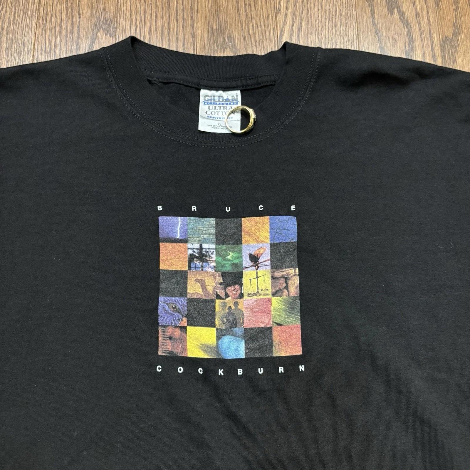 Vintage Bruce Cockburn Band T Shirt Music Graphic Tee 90s Y2K Black Faded XL L
Vintage Bruce Cockburn Band T Shirt Music Graphic Tee 90s Y2K Black Faded XL L