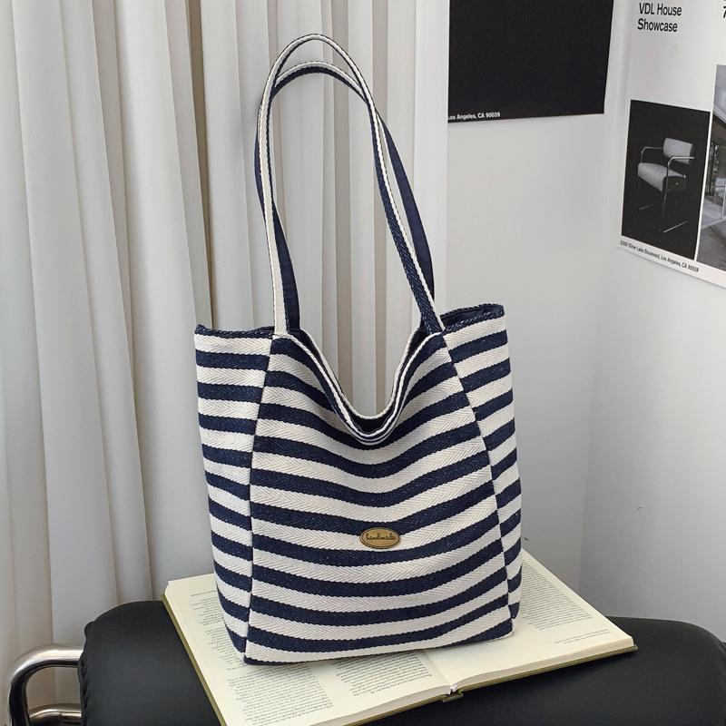 New Striped Casual Tote Bag Femininity Simple Casual Shopping Bag Light Commuter Shoulder Bag
New Striped Casual Tote Bag Femininity Simple Casual Shopping Bag Light Commuter Shoulder Bag