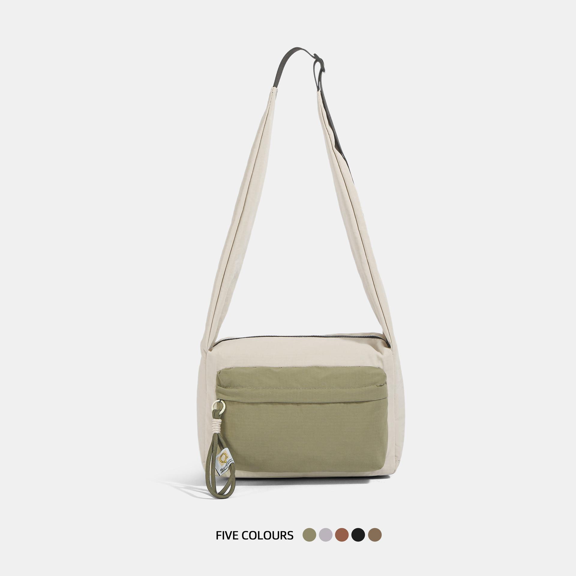 Niche design commuter bag tide shoulder messenger bag high sense small square bag light large capacity color matching cloth bag зелений
Niche design commuter bag tide shoulder messenger bag high sense small square bag light large capacity color matching cloth bag зелений