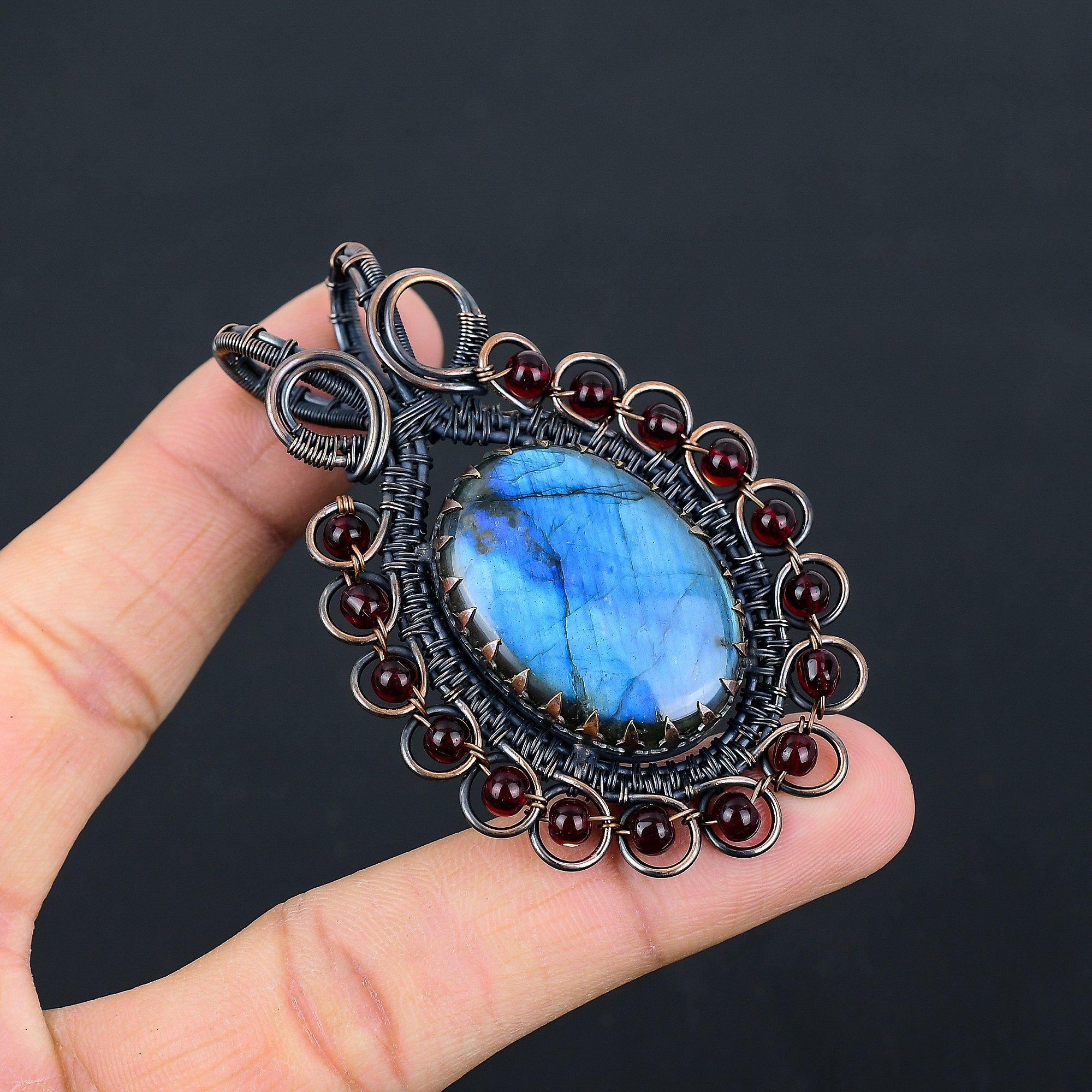 Необычный лабрадорит драгоценный камень чистая медная проволока обернутая ювелирные изделия ручной работы кулон 2.76 Inches синий 
Необычный лабрадорит драгоценный камень чистая медная проволока обернутая ювелирные изделия ручной работы кулон 2.76 Inches синий