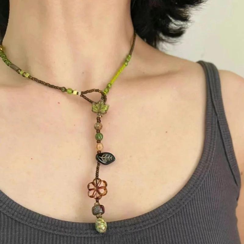 Ethnic Style Stone Beaded Hollow Flower Pendant Necklace for Women Adjustable Necklace with Rope Chain Beach Jewelry Gifts
Ethnic Style Stone Beaded Hollow Flower Pendant Necklace for Women Adjustable Necklace with Rope Chain Beach Jewelry Gifts