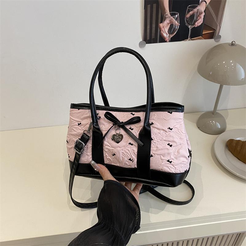 Summer new fashion temperament ballet seersucker bow small square bag large capacity fashion shoulder bag
Summer new fashion temperament ballet seersucker bow small square bag large capacity fashion shoulder bag
