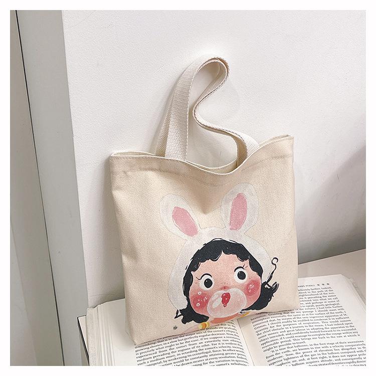 Japan and Korea Funny Illustration Cute Cartoon Girl Portable Canvas Bucket Bag Versatile Casual Student Bento Lunch Box Bag
Japan and Korea Funny Illustration Cute Cartoon Girl Portable Canvas Bucket Bag Versatile Casual Student Bento Lunch Box Bag