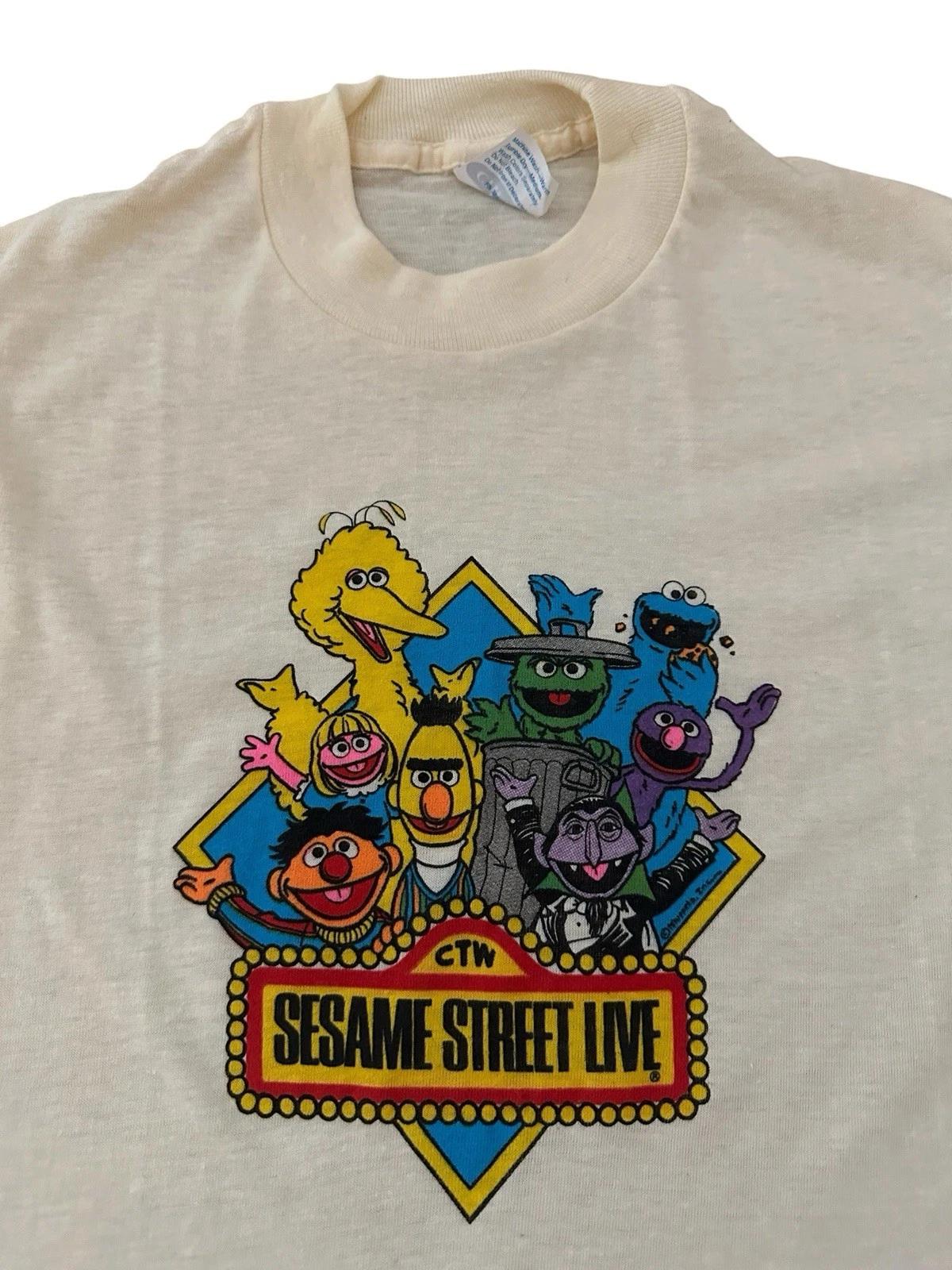 Vintage Sesame Street Live T Shirt Youth Large 80’s USA Deadstock Kids PBS 2XL
Vintage Sesame Street Live T Shirt Youth Large 80’s USA Deadstock Kids PBS 2XL