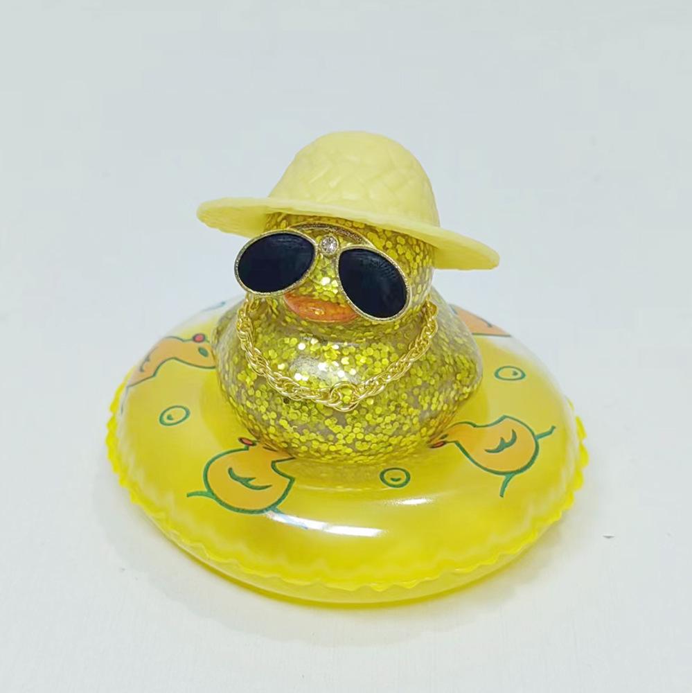Sparkly Sequin Duck Ornament with Gold Chain and Sunglasses
Sparkly Sequin Duck Ornament with Gold Chain and Sunglasses